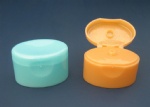 Oval flip top caps